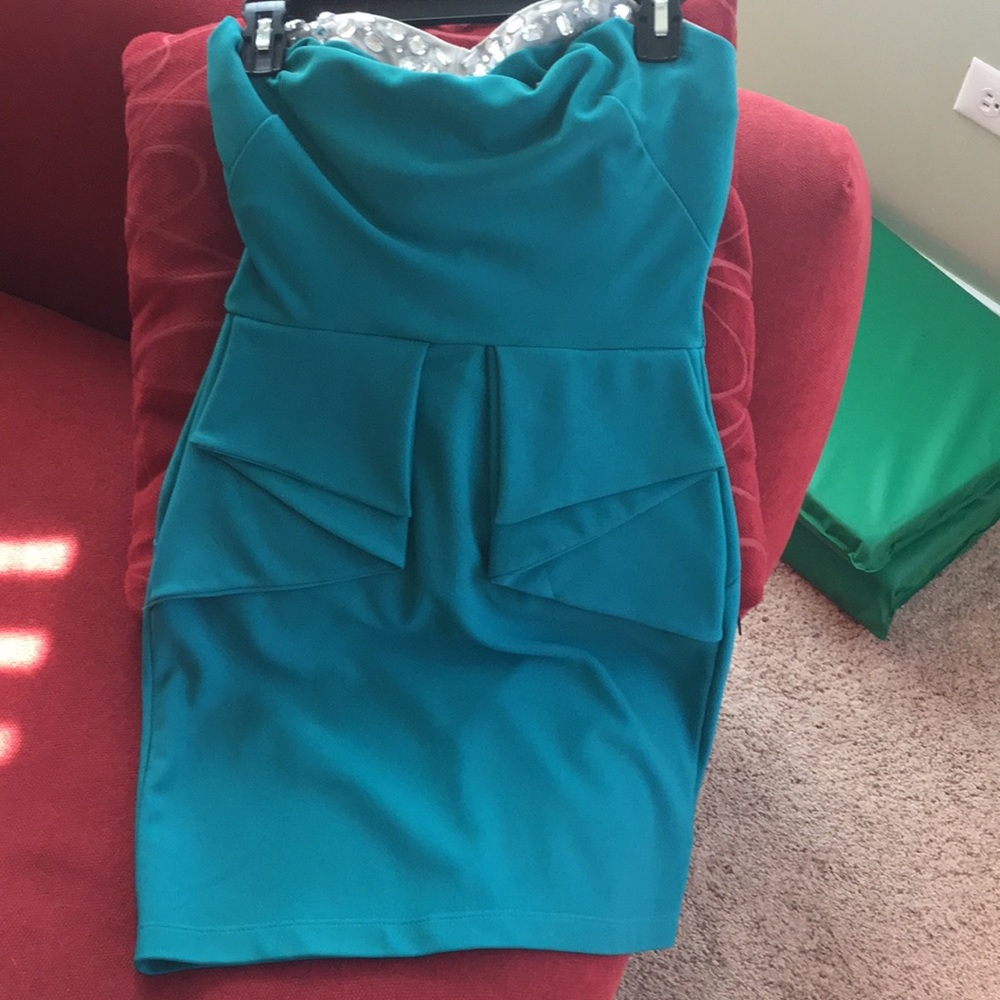 Turquoise dress worn twice